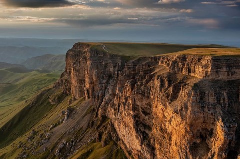 Aerial panorama view of plateau Bermamyt and hills at sunset, North Caucasus mountains, Russia,