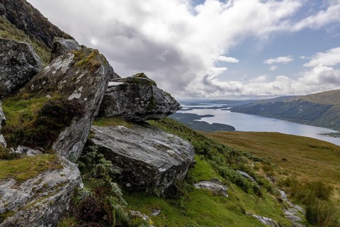 Rocks at the summit and views of Loch Lomond and the Loch Lomond and the Trossachs National Park