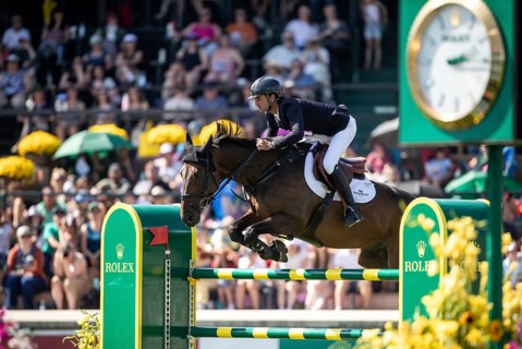 Steve Guerdat of Switzerland and riding Venard de Cerisy compete in the first round of the 1.60m