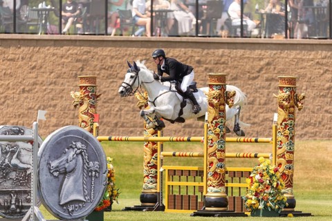 Daniel Coyle of Ireland and riding Incredible, compete in the 1.60m Grand Prix during The