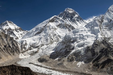 Classic, famous view of Mount Everest, called Sagarmatha in Nepal and Chomolungma in Tibet. Right