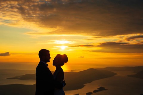 Silhouettes at sunset on Mount Lovcen in Montenegro