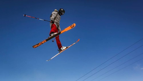 Skier jumping on a snow park in Austrian alps