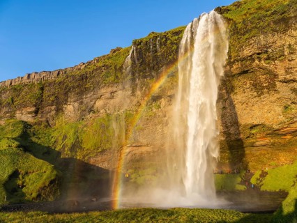 Rainbow at Seljalandsfoss waterfall, South Iceland, Iceland, Europe