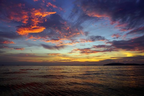 Beautiful fantastic colorful dramatic sea sunset landscape in Thailand
