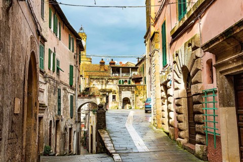 Narrow streets of the picturesque tuff town of Sorano. Etruscan towns of Tuscany. Fairy-tale stone