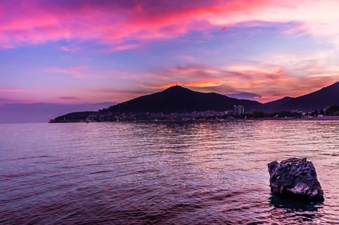 Sunset view on sea and Budva, Montenegro, Europe