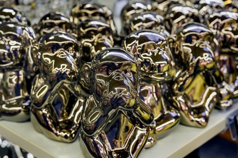 Monkey figures covering their mouths, a symbol of hearing, seeing and saying no evil, have become