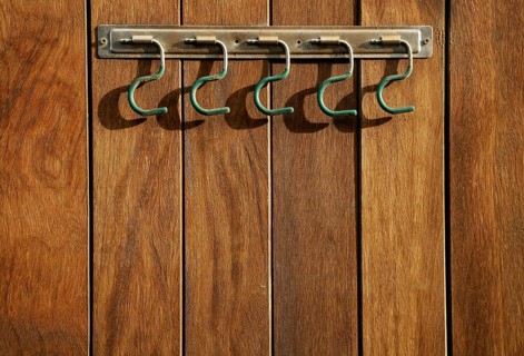 Rural hanger over wooden wall, horse stables