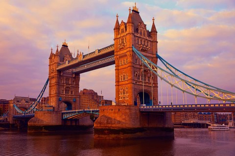 London Tower Bridge over Thames river sunset in England