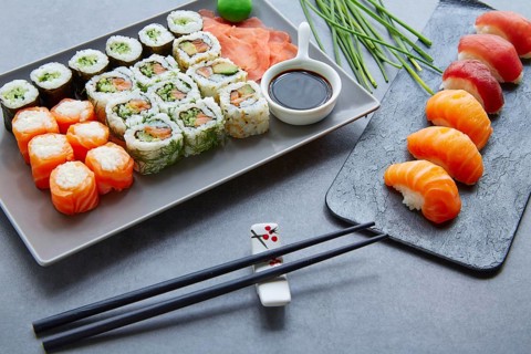 Sushi Maki and Niguiri California roll soy sauce and wasabi