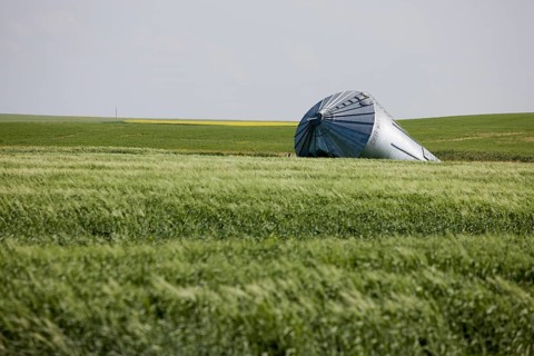 Metal Grain Bin Damaged tornado bent Canada