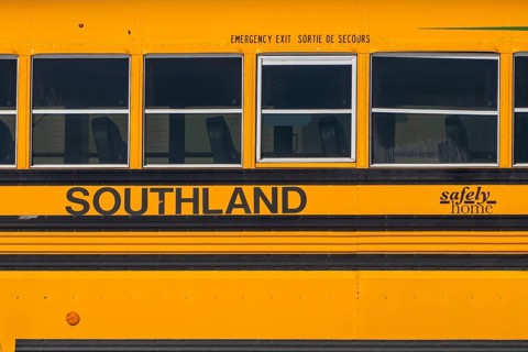 Calgary, Alberta, Canada. Mar 17, 2023. A close up to a Southland school Yellow bus