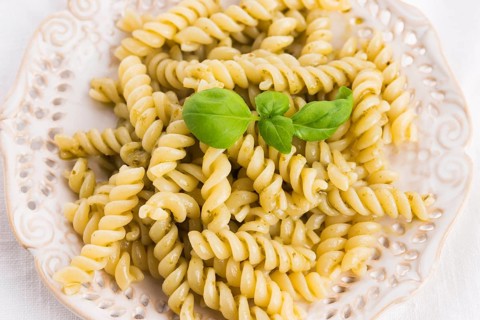 Italian fusilli pasta and fresh homemade pesto sauce