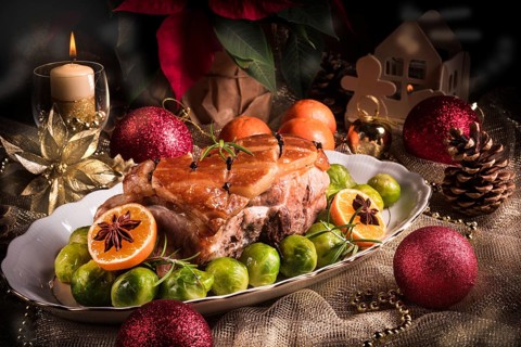 Christmas dinner with brussels sprouts in orange sauce