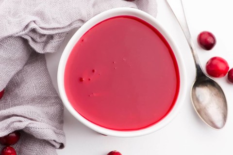 Bowl of Jelly with Cranberry on a white background