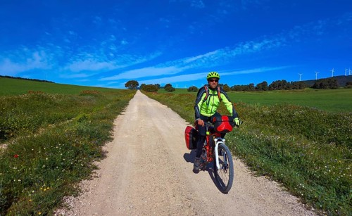 Biker by Camino de Santiago in bicycle at Saint James Way of Levante of Spain