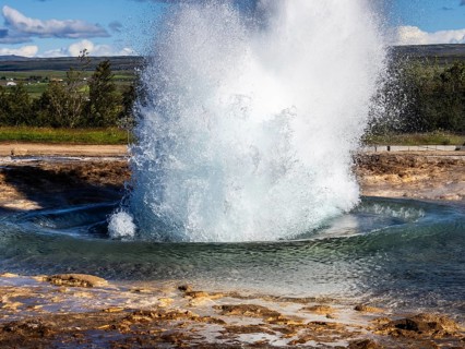 Eruption of the Strokkur geyser, hot springs, high temperature area in the Haukadalur valley,