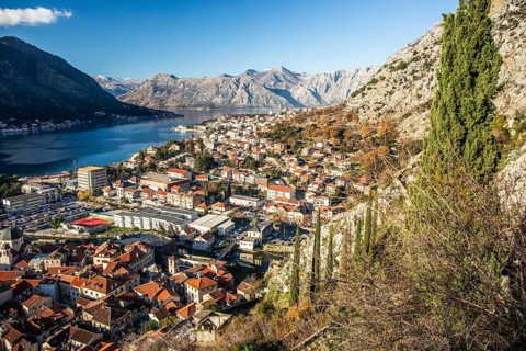 View of the town of Kotor and the Bay of Kotor from the hill above the town, Montenegro, Europe