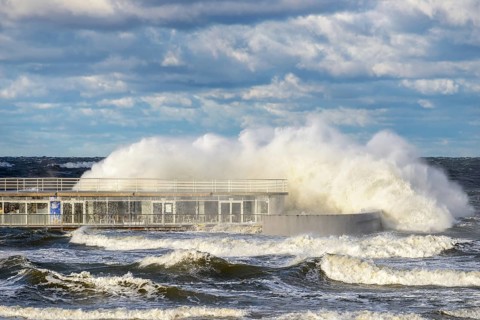 Large braking waves during a storm in Kolobrzeg on the Polish Baltic coast