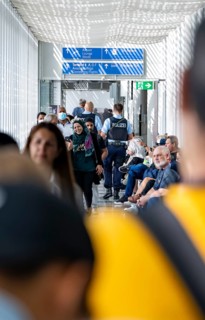Police and people at Munich Airport, Bavaria, Germany