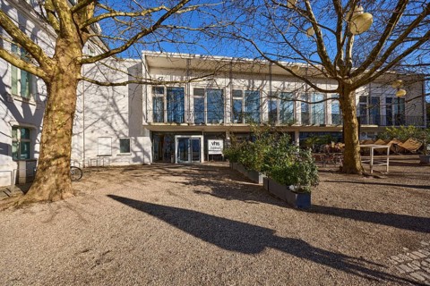 VHS Centre, Cafe Am Schloss, historical buildings, trees, flower pots, entrance area, blue sky,