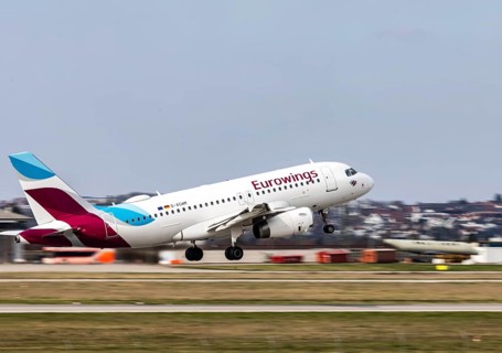 Stuttgart Airport STR EDDS. Manfred Rommel Airport. Eurowings aircraft taking off. Airbus A319-100