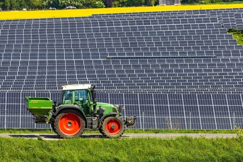 Agricultural land is used as a solar field. Tractor. Nellingen in the Swabian Alb. Nellingen,