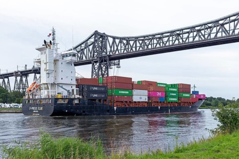 Container ship, cargo ship, high bridge, Kiel Canal, Rendsburg, Schleswig-Holstein, Germany