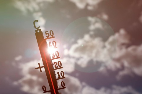 Symbolic image heat wave, thermometer in the sun, summer, climate change, temperature, record heat,