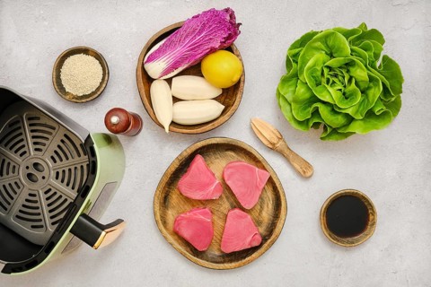 Ingredients for tuna steaks with fresh healthy salad ready for preparation in air fryer