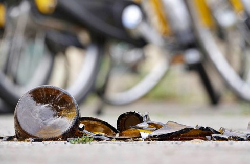 Broken bottle, broken glass, danger to passers-by and cyclists, Saxony, Germany