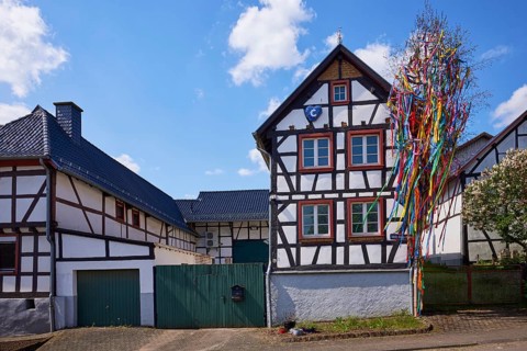 Half-timbered house with maypole in Pesch, Nettersheim, Eifel, Euskirchen district, North
