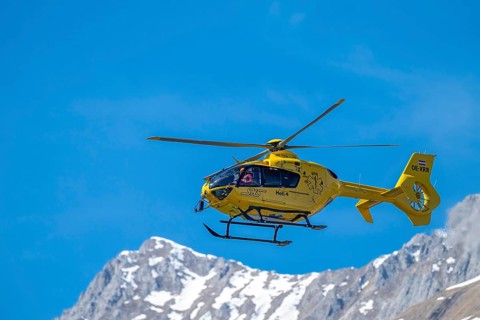 Rescue helicopter, emergency helicopter in flight, Schwaz, Tyrol, Austria