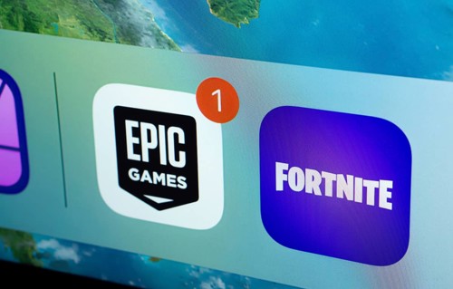 A close up of an iPad screen displaying the Epic Games and Fortnite app