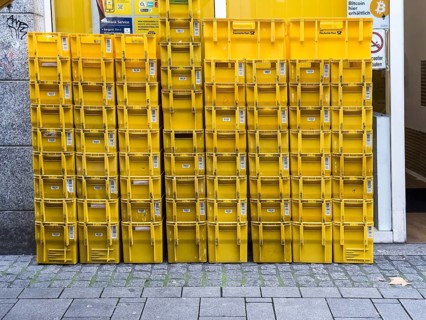 Stack of yellow post boxes in Düsseldorf, Germany