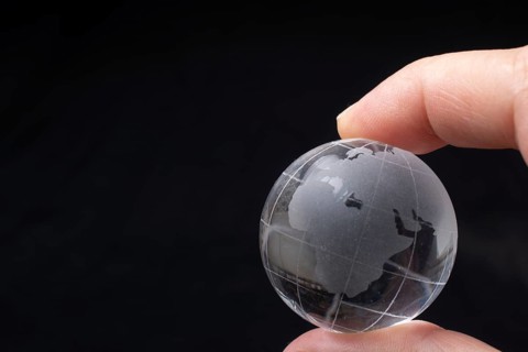 Glass globe for environment and conservation. Global business or education concepts
