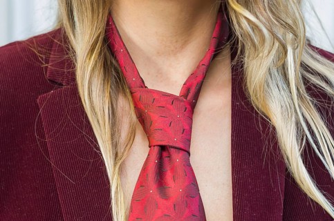 Great concept of women's rights, gender equality, gender, young blond and caucasian woman with tie