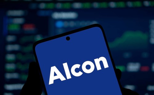 Alcon logo is displayed on smartphone. Alcon Inc. is a Swiss-American pharmaceutical and medical