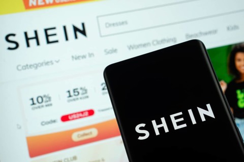 Dhaka, Bangladesh - 18 March 2025: The logo of the shein is displayed on a smartphone screen, and
