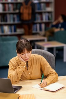 Girl studying university library