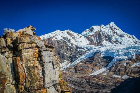 Photo of rocky mountains and Alpamayo, one of peaks of Peruvian Andes in Parque Nacional Huascaran