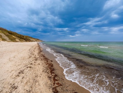 Baltic Sea beach in Ahrenshoop on the Fischland-Darß-Zingst peninsula, blue sky with clouds,