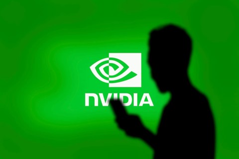 Nvidia logo on smartphone screen with AI in the background. Nvidia Corporation is an American