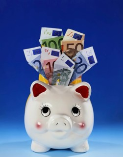 Symbol photo money, luck, saving, piggy bank with euro banknotes studio photo, Lower Saxony,