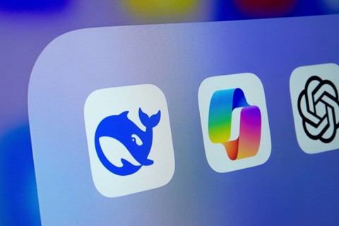 A close up of an iPad screen displaying the Deepseek, Copilot and ChatGPT app icon