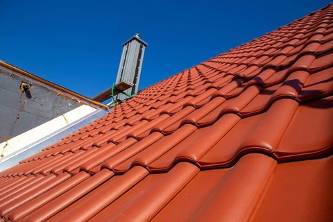 Close-up of a tiled roof that has just been tiled over