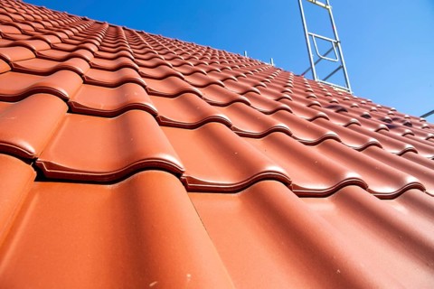 Close-up of a tiled roof that has just been tiled over