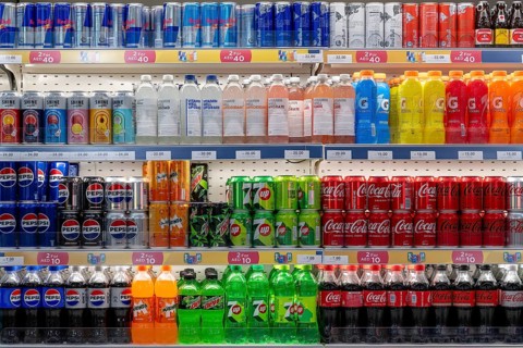 Sales shelf Red Bull, beverages Pepsi, Coca Cola