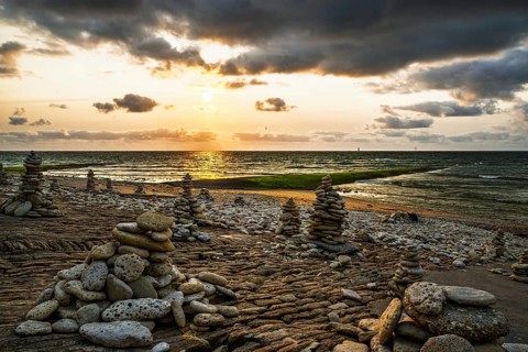 Sunset over beach of WHALE LIGHTHOUSE, Saint-Clement-des-Baleines, Atlantic, France
